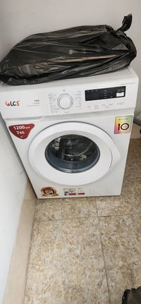 غسالة غير مستخدمة • مفتوحة من الكارتون