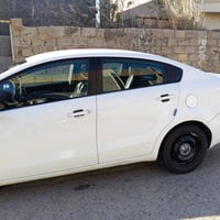 كيا ريو • ٢٠١٢ • جاملاغات امامية