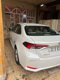 تويوتا كولاه 2023 بانزين ياباني ابيض صدفي ضمان شركة ساز مكينة 1800cc  ...
