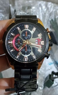 ساعة • ماركة مختومة • سير حديد