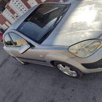 كيا ريو خليجي  2007 رقم انكليزي ب اسمي بيه جراد موضح بصورة كير محرك مك...