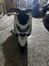 دراجة nmax ياباني قبل كم شهر ماخذهة برغي ممفتوح بيهة  محرك ١٢٥ گير cvt...