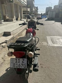 دراجه بوكسر موديل ٢٣ مرقم سنويه ولوحه بغداد تحويل بنفس اليوم دراجه مكف...