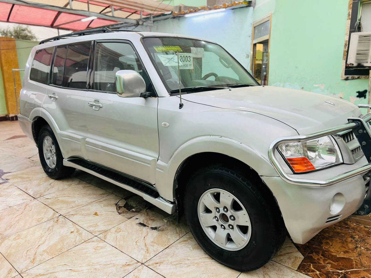 السلام عليكم للبيع باجيرو موديل 2003 رقم بصره مشروع وطني تحويل ثاني يوم سياره مكفوله من الكصه والنقل الجثه والضربه والكلبه والعيب الشرعي مكينه وكير اوتماتيك بلاد جدد حداده طخم تاير ويلكب جدد تبريد شغال سياره جاهزه وجديده السعر 79 ورقه الاستفسار الرقم ‏  ***********‏ مكان السياره البصره الزبير, البصرة
