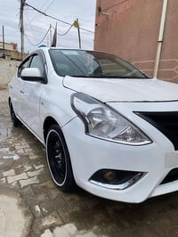 سياره نيسان سني 2022 بيها ضربه بجاملغ ودعاميه خلفيه مبدله تدفائة وتبري...