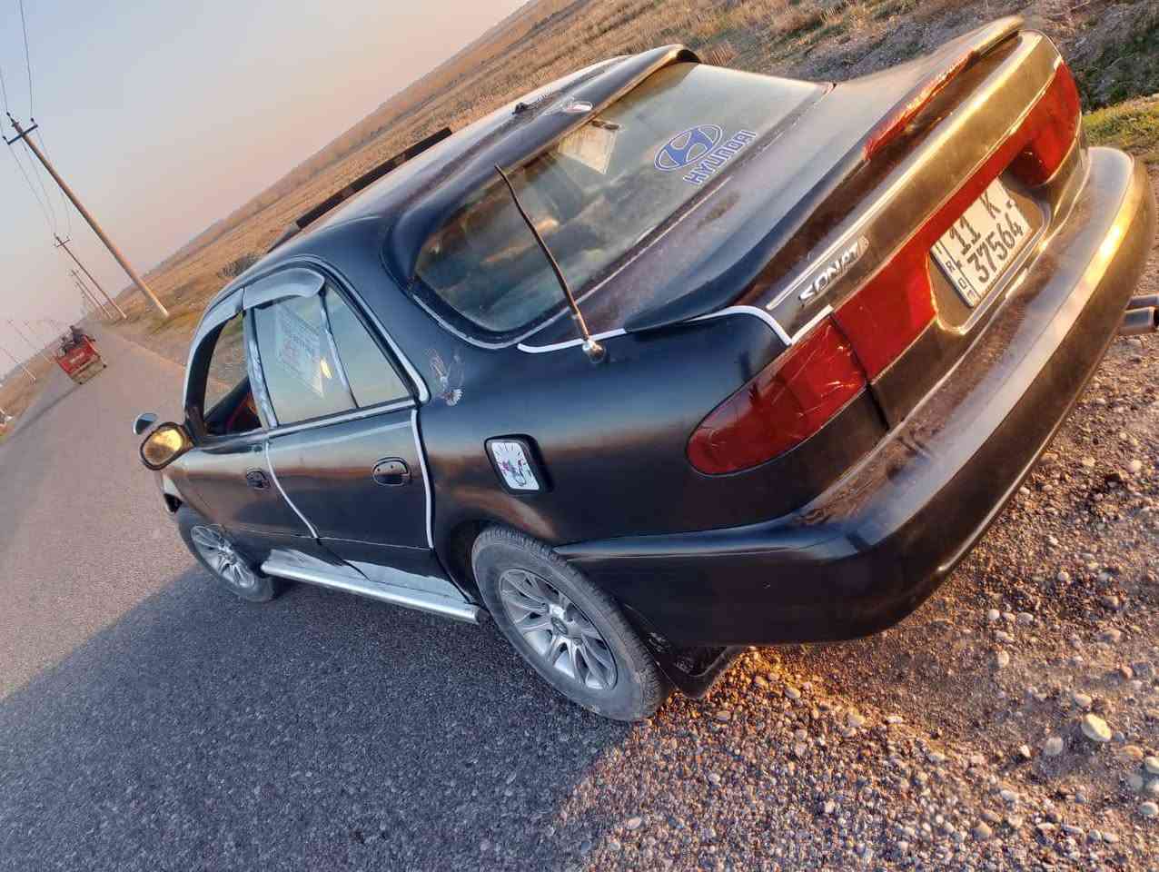 السلام عليكم سوناتا تو كير عادي مكينه مفتوح سنويه لل٢٩ صبغ عام للجماليه مكينه بيه  بخار تدفئة شغاله تبريد مايشتغل سعره ٣٨ بيه مجال بسيط مراوس هم يرهم حسب القناعه عنوان ديالى المقدادية تلفون ***********اتصال واساب
