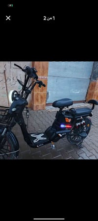 دراجة شحن للبيع شغالة كلشي مابيها  بس بيها نقص واحد  بطارية مابية  الس...
