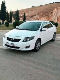 توێتا کرۆلا 2008 جەلیجی ناوزەرد مەکینە گەورە 1.8 سپی بەفری چوارجام کار...