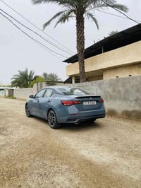 للبيع سينترا 2024  رقم بغداد معوقين  SR فول لاخير فتحا  كشنات جلد كهرب...