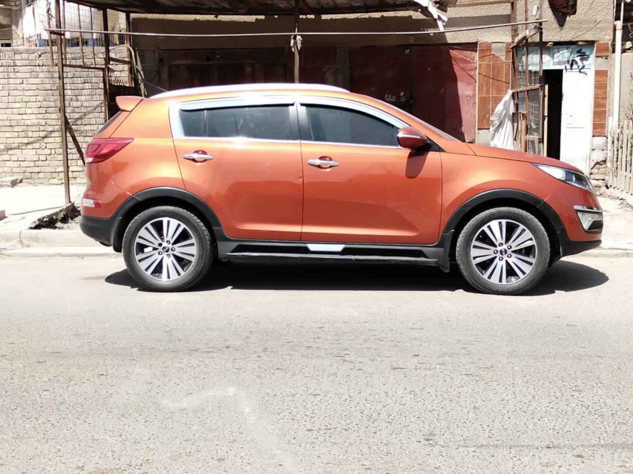 سبورتج ٢٠١٥محرك ٢٠٠٠خليجي صبغ بابين جهة السايق ماشيه ١٥٠الف بغداد ***********
