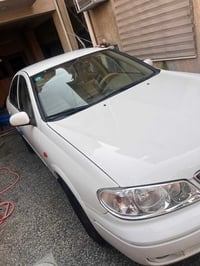نيسان سني ٢٠٠٩ ياباني قبق ابيض السياره جديده كلش ترايها يخبل بدون اي ن...