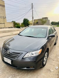 كامري رقم بغداد بأسمي  2009 وارد امريكي حادثها جاملغ خلفي الايمن ومصبو...