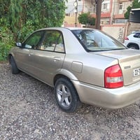 مازدا 323 • ٢٠٠٤ • اوتوماتيك