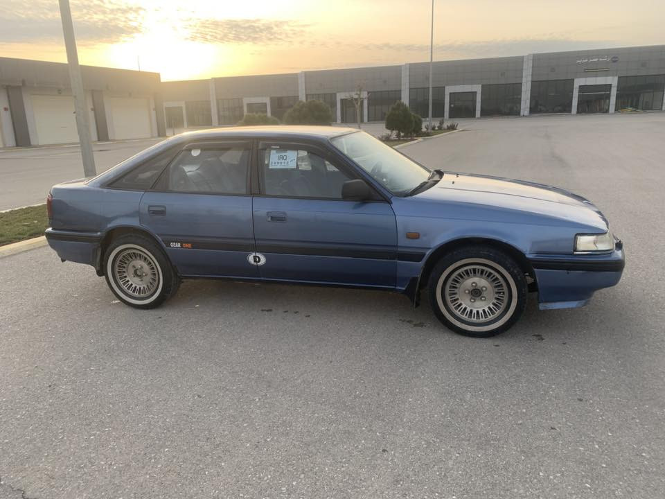 سەرەتا بەناوی خوای باڵا دەست
مازدا جانتا بۆ فرۆشتن 
مۆدێل ۹۱ 
ناو شین 
ئاڕم پلاستیکی هەولێرە
سەنەوی و پاکەنەی لەگەڵدایە
بەشەرتی ئاڕم و ئەوەلیات 
مەکینە ۱۲ و بەخ 
تەبرید سارد و گەرم لەسەرسیوچ
٤ تایەو ویل سۆپەری خەت سپی
٤ جام کارەبای 
هەردوو ئاوێنە کارەبای 
مەکینەی هەڵم و بوغاری نیە
بەشەرتی سەد فیتەر 
تەقەو ڕەقەی بەشەرت
کارەبای هەموو گیانی بەشەرت
خایساتی هیچ نیە 
دەعم و لێدراوی نیە 
دەعامی بۆ دەعامی بەشەرت 
سعری ۳۰ گەڵاو مجالێکی برایانە
بۆ پەیوەندی ۰۷۷٦۱٨۲٨٨٨٤
