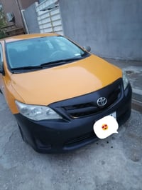 كورلا تكسي موديل 2009 خليجي السعر 95 رقم الهاتف 07703537839