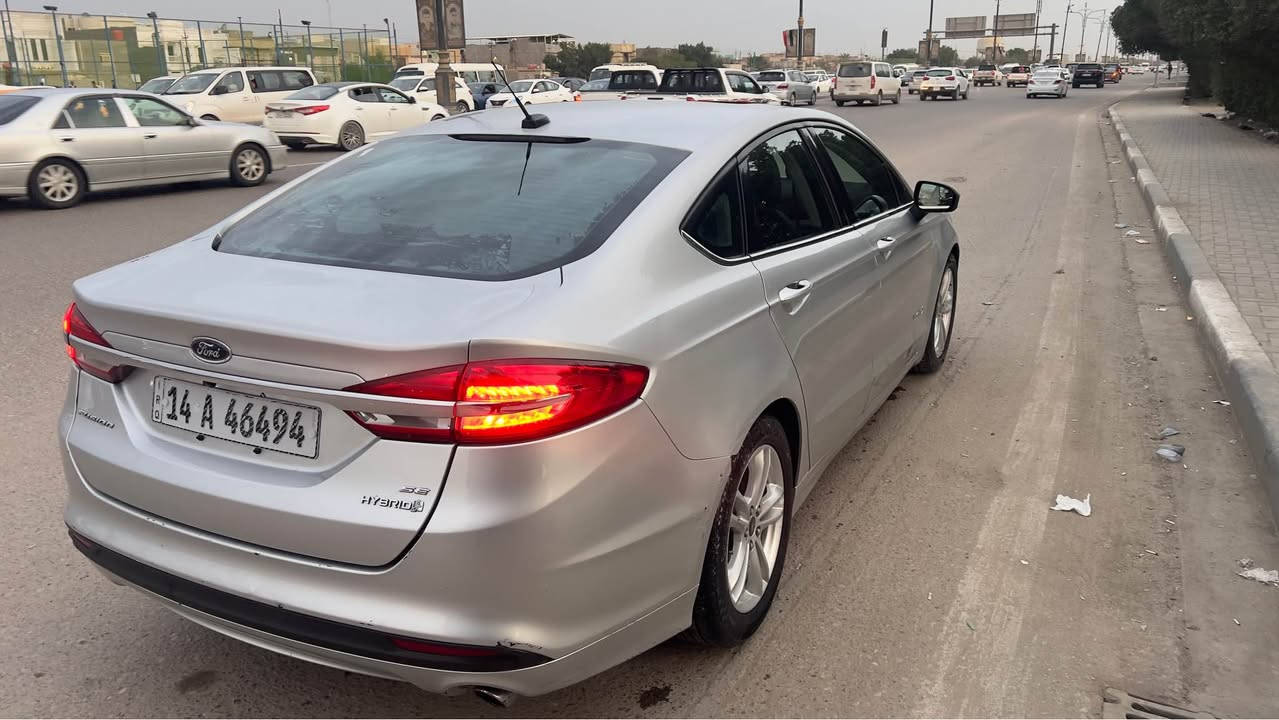 السلام عليكم سيارة فورد فيوجن هايبرد مكينة 2000 هايبرد فول مواصفات حتى فتحه و بصمة سيارة مديل 2018 ماشيه 130 الف سيارة رقم بصرة ب اسمي رايدها ب 115 و بيه مجال سيارة ابيع صبغ حزام  بدون معجون و بيه باب سائق مبدل سيارة حلوة كهربائية كلها بلادية سيارة ما ملعوب بيه ابد مكاني ب البصرة سيارة حادث امريكا الجاملخ الايمن و ب العراق الايسر و بعدني ما مصلحه رقمي *********** البصرة, العراق
