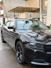 جارجر للبيع  Dodge Charger_2022_SXT اللون: اسود وارد امريكي: جنطه مصلح...
