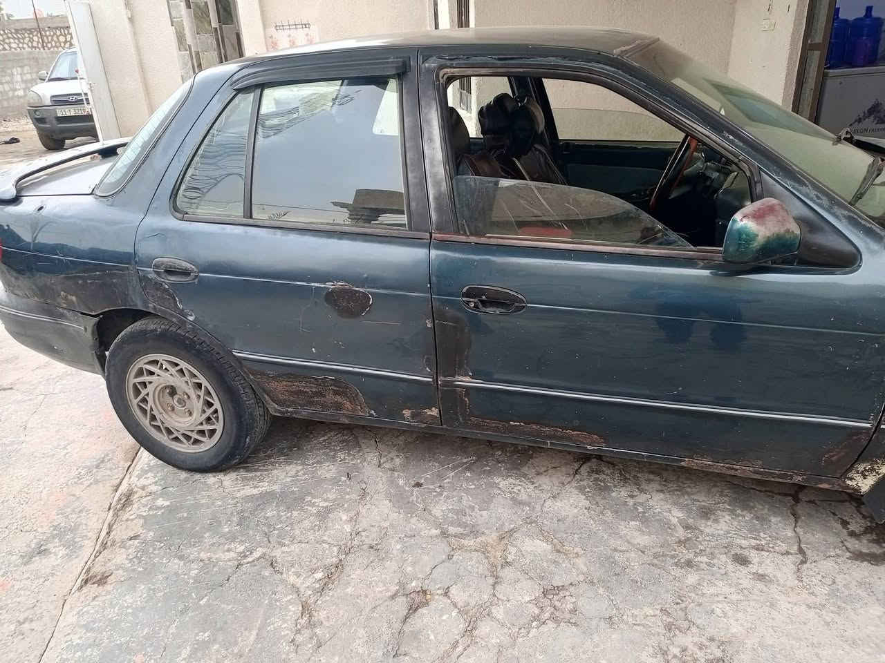 كيا سيفيا 94رقم واسط دولي  كير ومحرك مكفولات لاخياس وال ضربه كلها بلاد وناعمه صدرجديد سعر٢٧وبيها مجال عنوان صويره ***********
