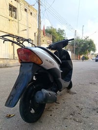 دراجة سوزوكي • معدلة • أوراق