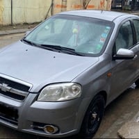 شۆفلێت ئەڤیۆ مۆدیل 2007 سەیارەکە بێ سەرەتایە ساخە مەکینە گەورە گێڕ عاد...