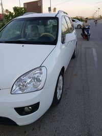 كيا كارنز • ٢٠١١ • رقم بغداد الدولي