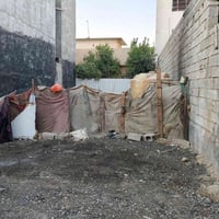 للبيع قطعة ارض 100متر  الواجهة 6.70النزال 14.80زراعي سند 25 في شارع  ا...