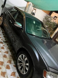 ٢٠١٣ • جلد عسلي • اوتوماتيك