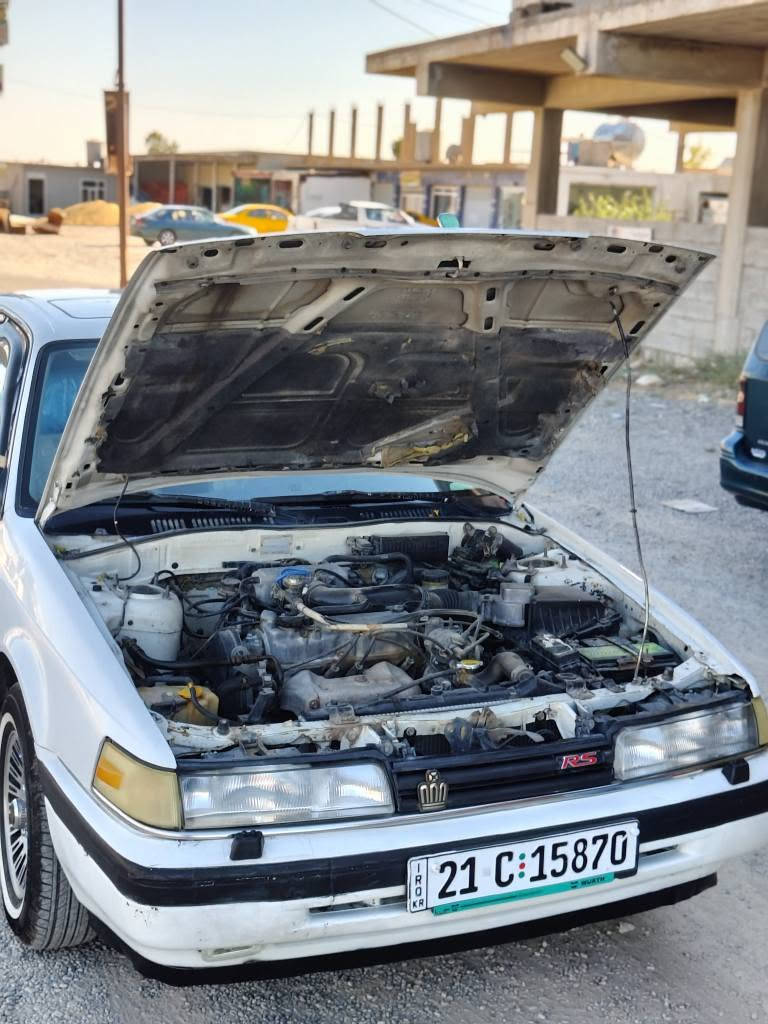 🚗 مازدا مۆدێل 1988 (خاوێن و بێمەشغەڵەت)
​بۆ فرۆشتن، ئۆتۆمبێلێکی زۆر خاوێن و توندوتۆڵ بە مەرج و مواسەفاتی نایاب:
​🔹 مواسەفات و تایبەتمەندییەکان:
​جامەکان: چوار جام کارەبایی
​سەقف: سڵاید
​گێڕ: عادی
​تایە و پاتری: چوار تایەی تازە و پاتری تازەی بۆ بەستراوە
​گێڕ و مەکینە: بەشەرت و بێ کێشە
​🔹 دۆخی یاسایی و بەڵگەنامەکان:
​ژمارە: سلێمانی (ڕەقەم باریک)
​سەنەوی: 2023 بەسەرچووە
​تەحویل و غەرامە: بەشەرت (موس بڕاوە و ئامادەیە بۆ تەحویل)
​🔹 دۆخی بۆیاخ و بەدن:
​بۆیاخ: سبوغی بیلادی خۆیەتی
​تێبینی بۆیاخ: تەنها یەک پەڵە لە چامڵغی پێشەوەی لای سایەق سبوغە، باقی گشتی بەشەرت.
​📍 شوێن: کەرکوک
​📞 ژمارەی مۆبایل: *********** كركوك, العراق
