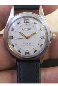 كيورا • سويسري • قطر ٣٢