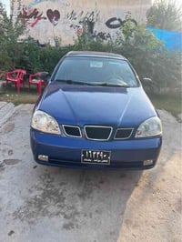 اوپترا ٢٠٠٤ • اوتوماتيك • صبغ جديد