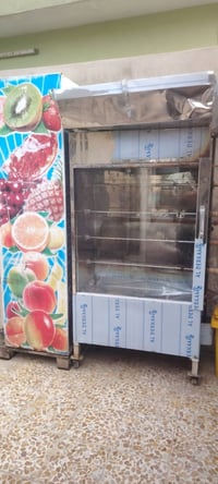 شواية دجاج • عارضة