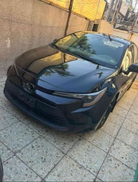 كورلا وارد امريكي موديل 24لون اسود حادث جاملخ خلفي فقط محرك الفين ماشي...