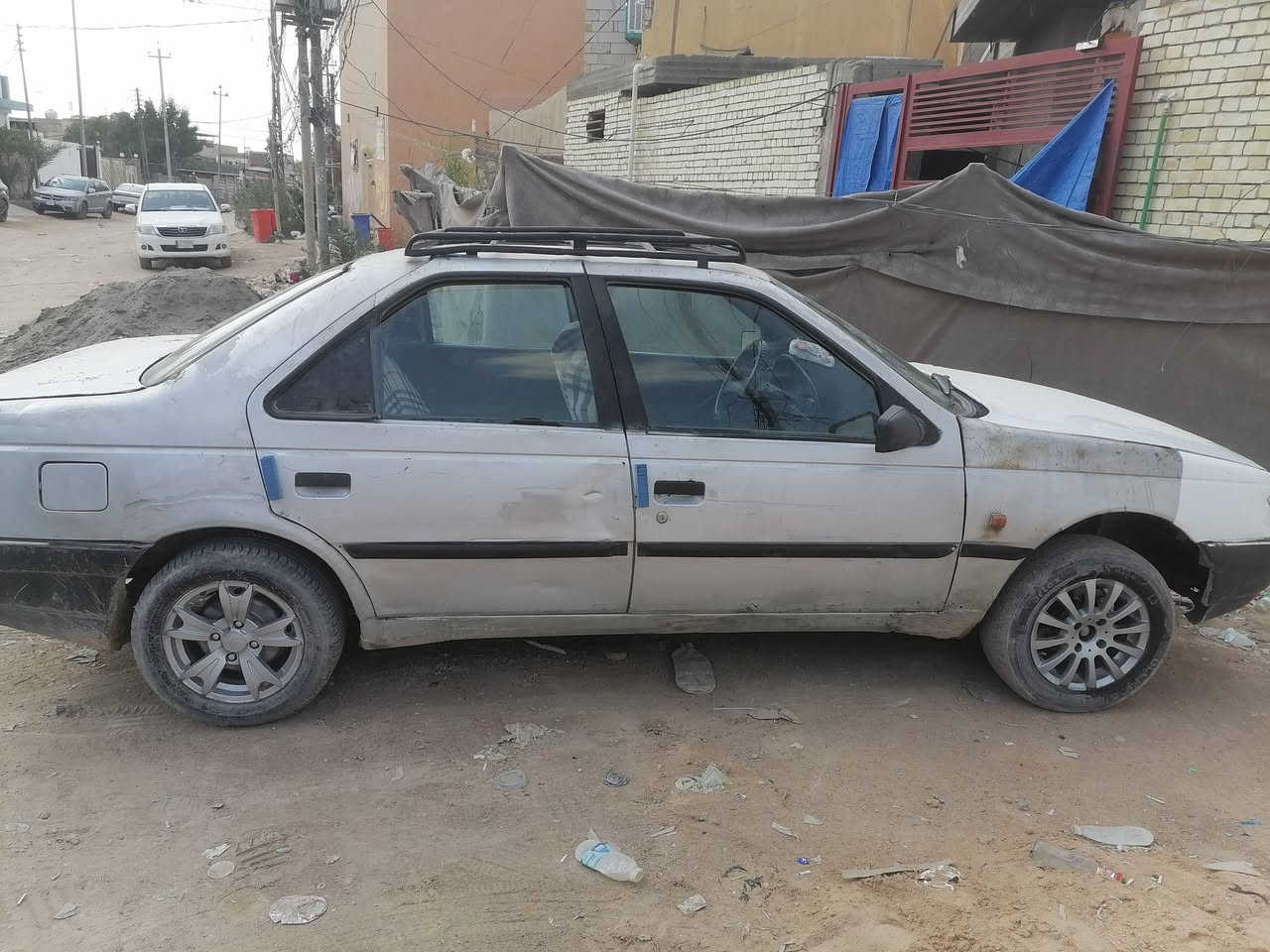 سياره بيجو للبيع مكفوله مكينه نضيفه وكير نضيف خير من الله مداور مكاني كوفه مقابل مستشفى الفرات ***********
