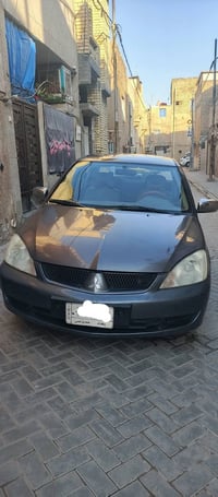 لانسر 2010 • مكينة 1600 • ما بيها حادث