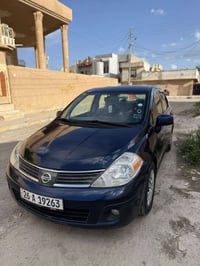 فيرسا 2009  محرك 1800  كير At المرغوب  تدفئه وتبريد شغاله  تخم تايرات ...