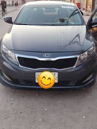 كيا اوبتيما • امريكي • رقم بغداد