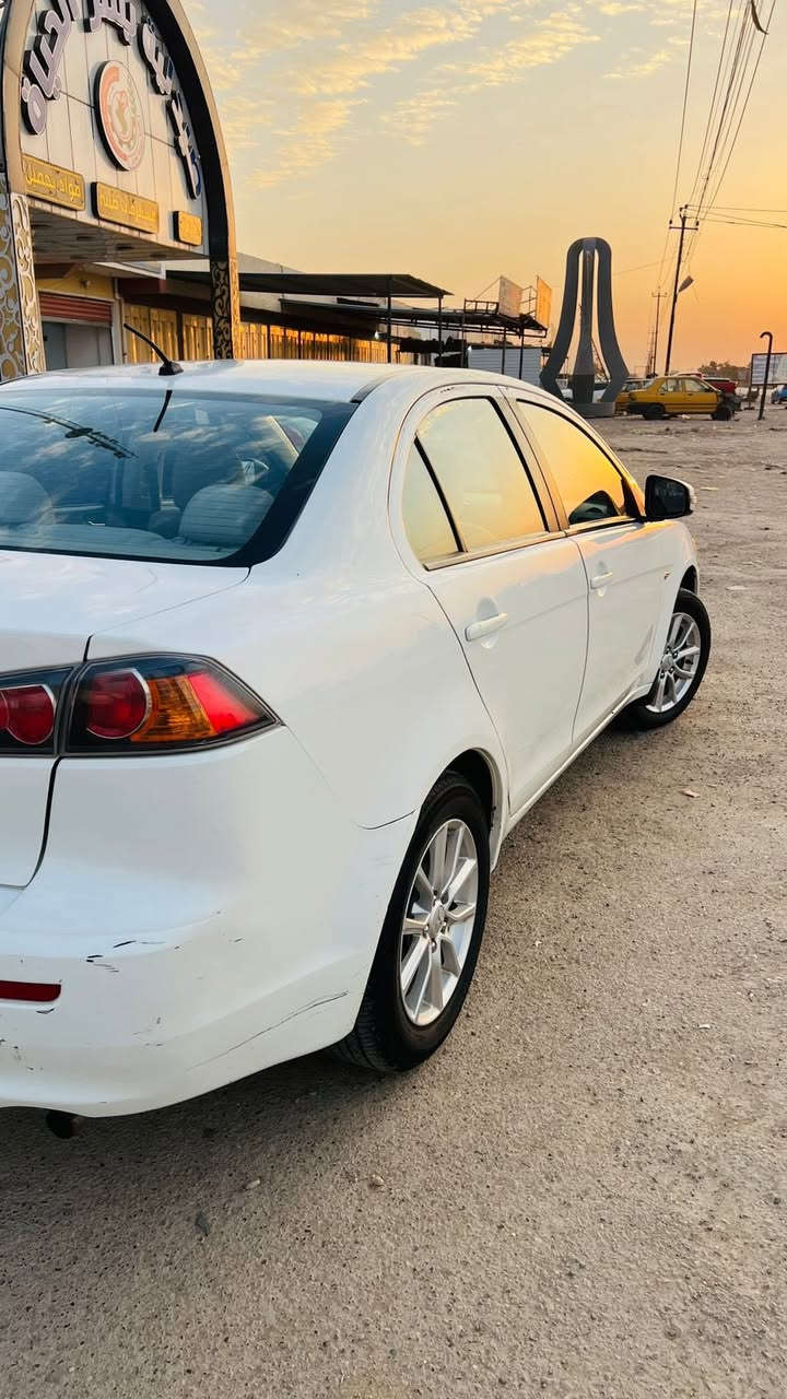 السلام عليكم 

لانسر 2016 شكل القرش 

مكفولة من الصبغ 

بيهة بارد قليل 

كير مكينة تبريد حدادية 

كفالة عامة 

رقم بغداد الجديد 

سنوية بسمي 

شرط التحويل

 مكينة 1600

شاشة 

كامرة خلفية

تحكم ستيرن 

مكاني بغداد 

والستفسار 

***********
