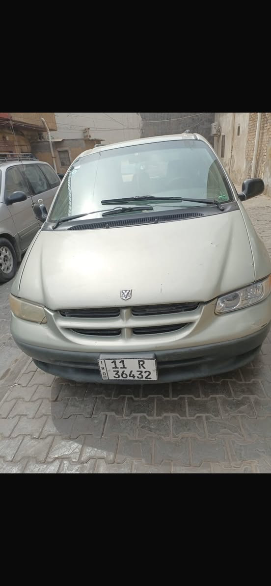 دوج كرفان للبيع محرك وكير خير من الله لا تنقيص ولا تبخير تحكم بل مري شغال تبريد شغال ثلج  كشر مثل مجاي شوف بلادي غرفة نضيفة وبلادي سيارة حلوة المكان بغداد حي آور او مدينة تحويل ثاني يوم ***********
