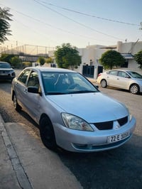 لانسر ٢٠٠٩ • سند لحد ٢٠٣٠ • مكينة وفتيس