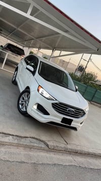 تيتانيوم • بانوراما • شاشة تيسلا