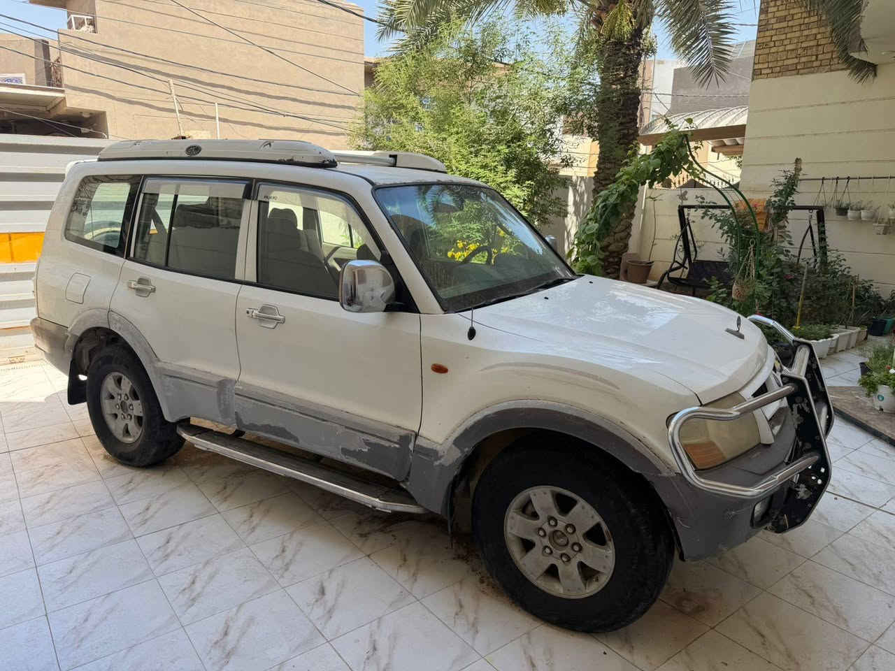 السلام عليكم للبيع سيارة نوع باجيرو موديل ٢٠٠٤ مكينه بلادي وكير اوتوماتيك عل الشرط حداديه كهربائيات جاهزه تبريد عوزه غاز دواخل نضيفه ما بيهن نقص مكفوله من الضربه والصبغ السياره كلش نضيفه تجي وتشوفه رقم كربلاء مشروع وطني سنويه لغاية ٢٠٢٧ تحويل بأي وقت السعر ٦٥ ورقه وبيها مجال قليل موبايل *********** مكاني ديوانيه
