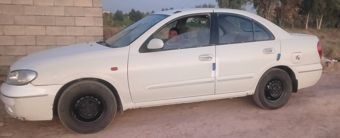 نيسان سني رقم بغداد الجديد موديل 2006 محرك 1800المرغوب صبغ عام جمالية شرط بدون ضربه   تبريد ثلج محرك كير مكفول كير عادي تخم تاير جديد داخل السيارة جديد السعر 74 مكان السيارة ديالى للاستفسار الاتصال على الرقم ***********
