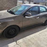 فورتي موديل 2012 مصبوغه بيها منظومة غاز جديده محرك 2000 سياره خير من ا...