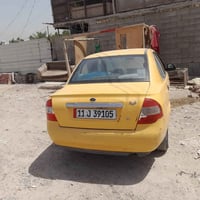 طيبه ٢٠١٥ رقم بغداد  سياره حلوه ونضيفه غرامات وهيئه مصفره السياره احلي...