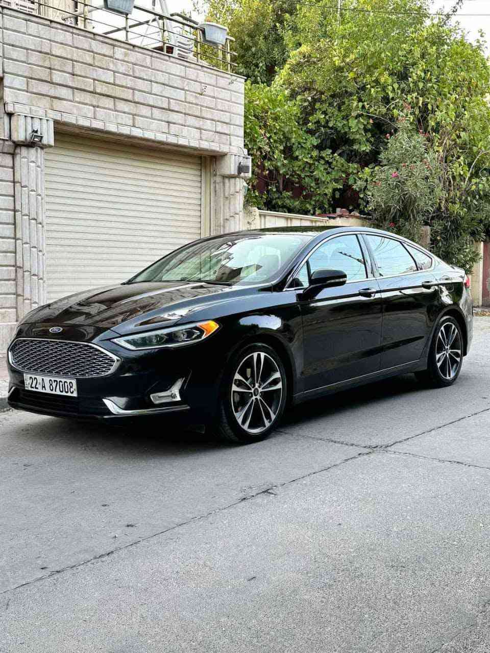 فورد فيوجن  تيتانيوم 1/1 موديل 2019 مكينه 2000 تيربو 
ماشية 135 الف 
مواصفات 
رادار امامي خلفي 
حساسات 
كامرا 
سلايد 
كشنات كهرباء الجهتين وخزن وتبريد وتدفئه 
ايناره داخليه 7 الوان 
تبريد قطعتين 
تحديد مسار 
تشغيل عن بعد 
دخول ذكي بدون مفتاح وترحيب 
شاشة كبيره تدعم كار بلي 
رقم اربيل باسمي 

عنوان السيارة بغداد
 حادثها فقط دعامية خلفية
2019
ماتۆری 2000 تۆربۆ
ڕۆیشتووە 135 هەزار

تایبەتمەندییەکان:

* ڕاداری پێشەوە و دواوە
* حەساسات
* کامێرا
* سانڕۆف (Slide)
* کورسی کارەبایی لە هەردوو لا، لەگەڵ خەزن، ساردکەرەوە و گەرمکەرەوە
* ڕووناکی ناوەوە بە 7 ڕەنگ
* کولێری دوو ناوچە (Dual A/C)
* پاراستنی هێڵ (Lane Keep Assist)
* کارپێکردن لە دوورەوە
* چوونەژوورەوەی زیرەک بەبێ کلیلی و پێشوازی (Smart Key & Welcome)
* شاشەی گەورە پشتگیری CarPlay دەکات

ژمارەی هەولێر بە ناوی خۆمە

شوێنی ئۆتۆمبێل: بەغدا

تەنها ڕووداوی دعامییەی دواوەی هەبوو
***********
*********** بغداد, العراق
