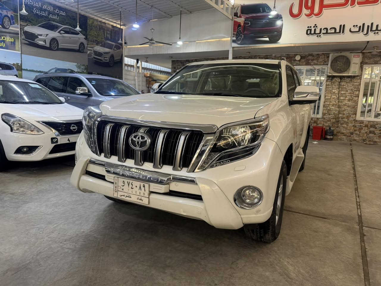 🔷 معرض الإمام المركزي 🔷
📍 العنوان: بغداد – الكريعات – شارع الوقف السني

⸻

🚘 تويوتا برادو 2014 VX
🔹 فول مواصفات – رقم بغداد

المواصفات:
 • بصمة فتح وتشغيل
 • مقاعد جلد
 • كراسي كهرباء
 • تبريد كراسي (أمامية + خلفية)
 • لايت زينون
 • زراك لايت
 • ستيرن كهرباء
 • 6 سلندر
 • محرك 4000
 • 7 ركاب
 • 3 قطع
 • عداد المسافة: 114,000 كم

الحالة:
 • السيارة بيها شخوط خفيفة (غير قوية) جهة عكس السائق
 • بارد بمقدار إصبعين بالبلب، والباقي مكفول

⸻

💰 السعر: 320$
✔️ مجال بسيط

⸻

📞 للاستفسار:
***********
***********
