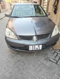 لانسر ٢٠١٠ • محرك ١٥٠٠ • رقم انكليزي