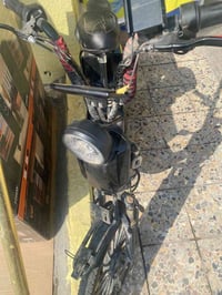 بغداد المشتل • دراجة كهربائية • قفل