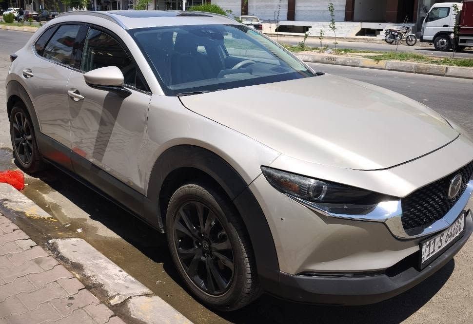 Mazda CX-30 Premium
موديل 2023 Premium محرك 2.5 لتر 4 سلندر 
رقم الشاصي (VIN): 3MVDMBDM1PM529493
المواصفات الأساسية
محرك 2.5 لتر Skyactiv-G
قوة 191 حصان
عزم 186 رطل/قدم (252 نيوتن.متر)
گير أوتوماتيك 6 سرعات
نظام دفع رباعي AWD قياسي
استهلاك وقود (حوالي 12.3 كم/لتر) �
Edmunds +١
تجهيزات فئة Premium
مقاعد جلد
شاشة عرض على الزجاج الأمامي (HUD)
نظام ملاحة
باب خلفي كهربائي
مصابيح أمامية متكيفة مع المنعطفات
قضبان سقف
بدالات تبديل سرعات خلف المقود (Paddle Shifters)
نظام صوت Bose بـ 12 سماعة في أغلب السيارات من هذه الفئة �
السيارة في كركوك
ضررها بونيد صبغ فقط وبيها شوية دواخل 
وصور الضرر مرفقة 
***********
السعر 160 كركوك, العراق
