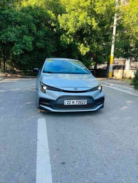 تويوتا كورولا 2021se وارد امريكي  محرك 2000cc   شاشة كبيرة بلاد ابل كا...